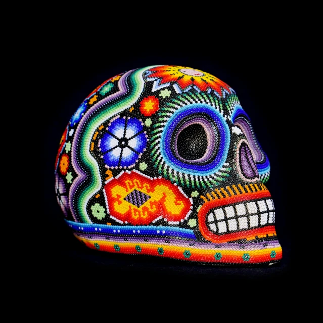 a colorful skull on a black background