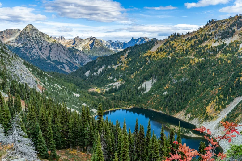 view of a large lake with mountains in the background