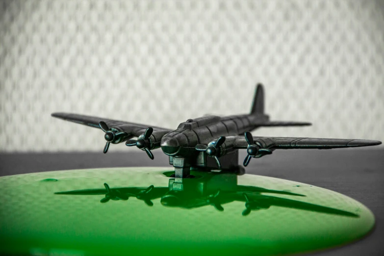 this is an air plane model on a green surface