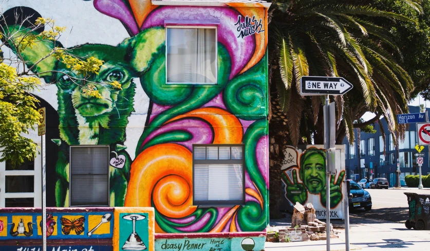 colorful building with colorful paintings in the street