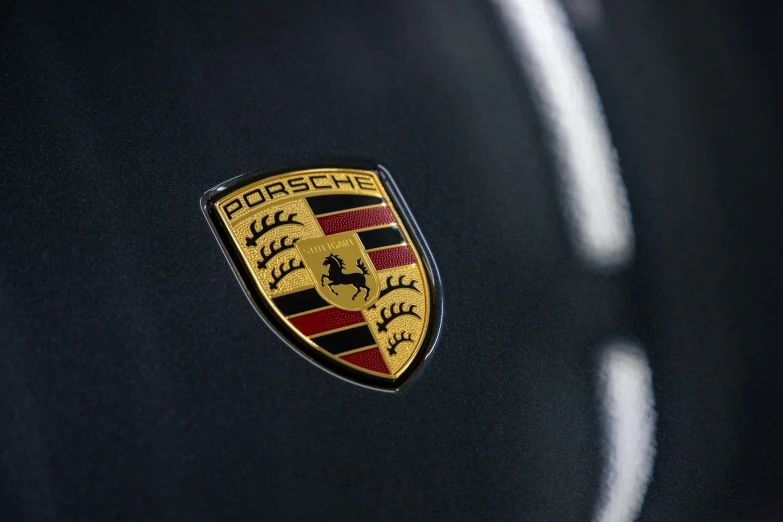 the emblem on a black car with the ferrari logo