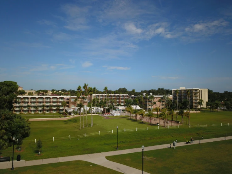 the building in the distance is surrounded by trees