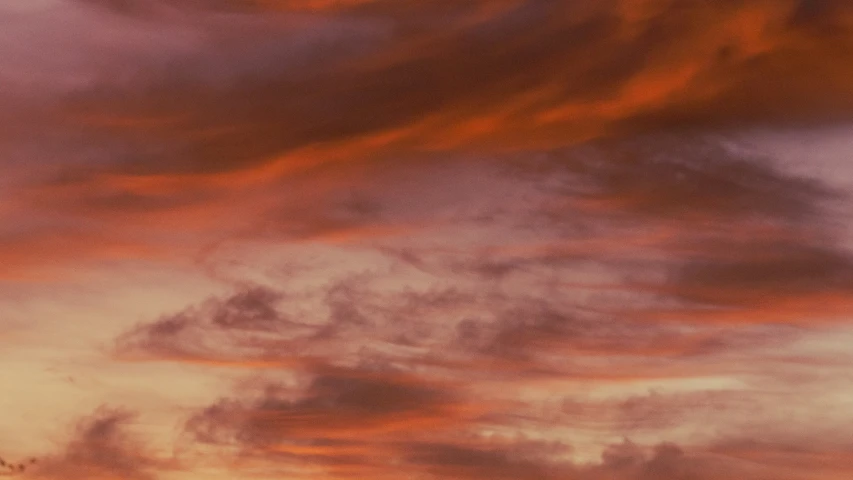 a airplane in the sky during sunset or sunset