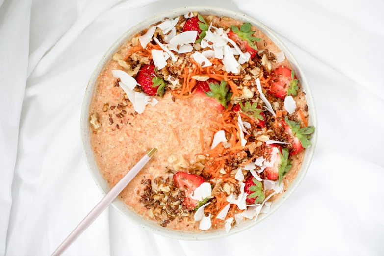 a bowl of food with various ingredients is seen from above