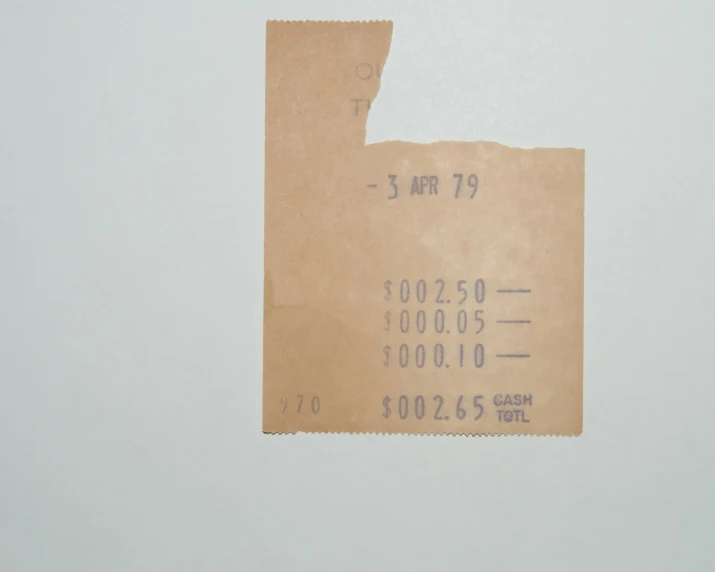 a ticket has been placed in a brown paper with some type of stamp