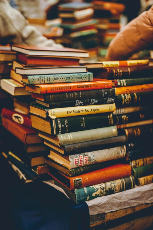 piles of book sitting on top of each other