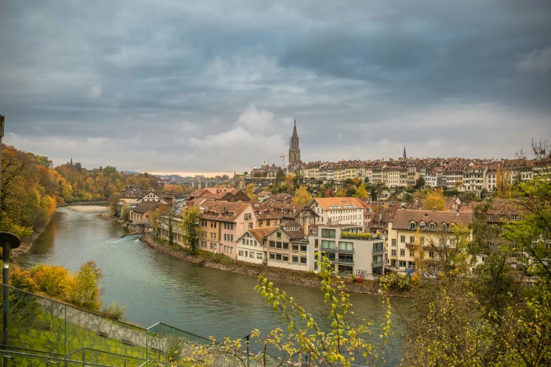 a scenic view of the city and river below