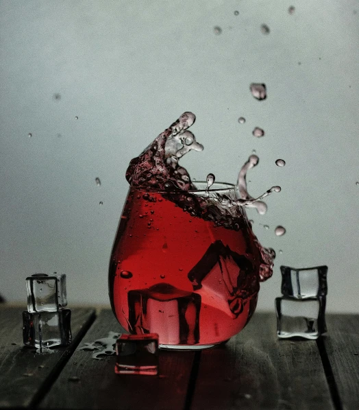 a red object is being soaked by water