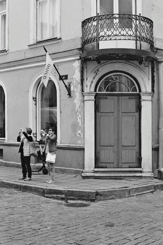 a street scene with a car and a person walking