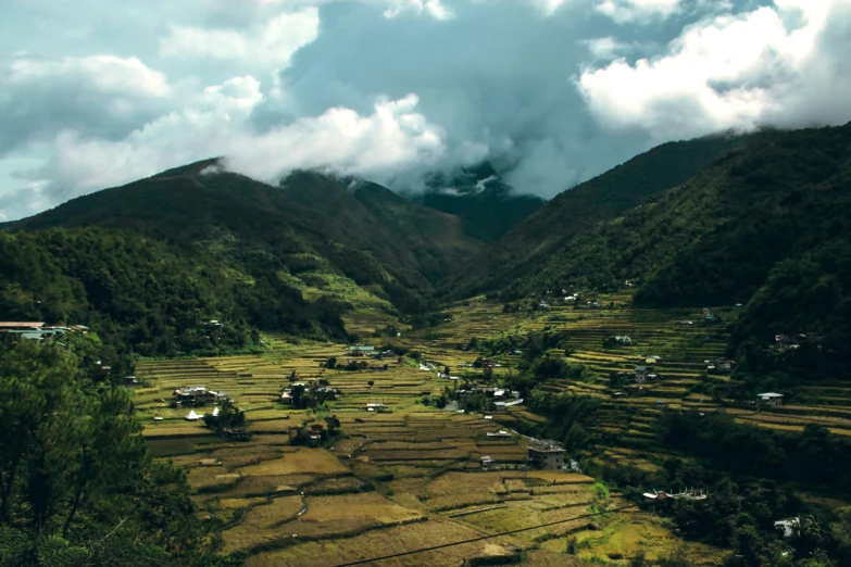 a valley that has a lot of grass on the side