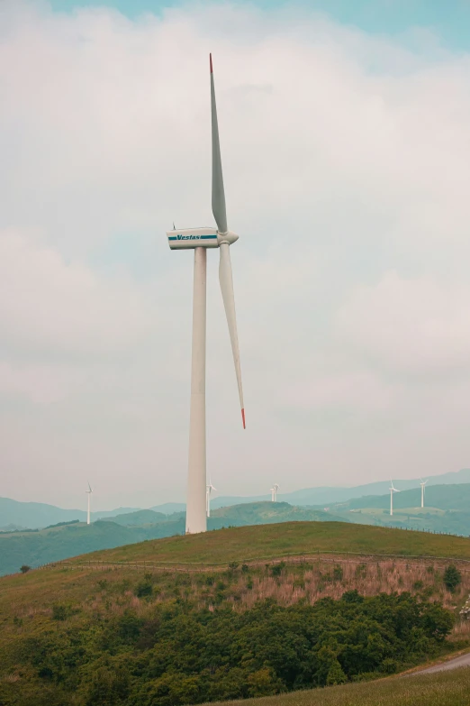 there is an odd view of a windmill