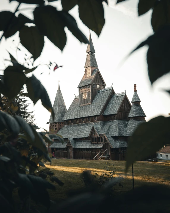 an old church with tall spires and a steeple