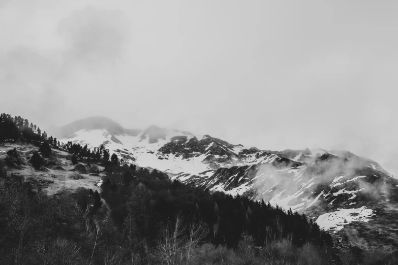 the mountain is full of snow in the middle of winter