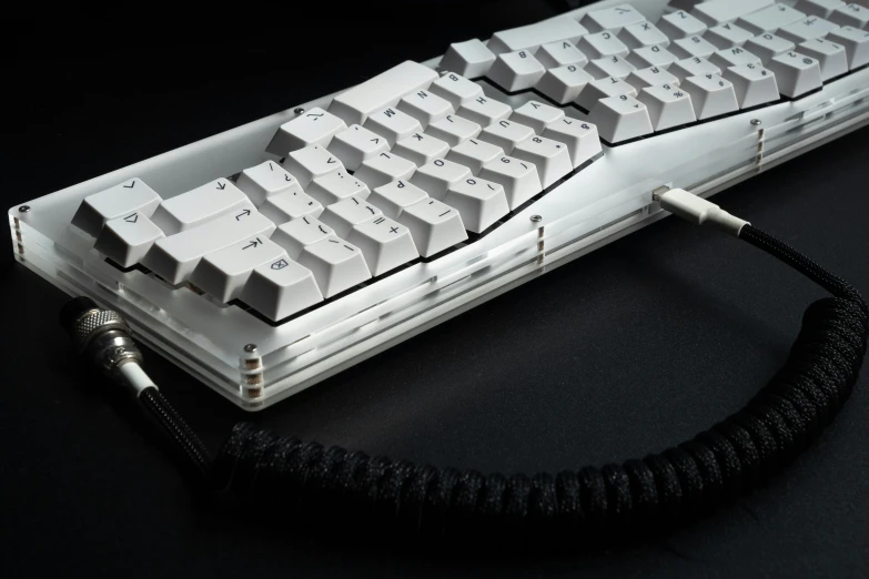 a black and white computer keyboard on a table