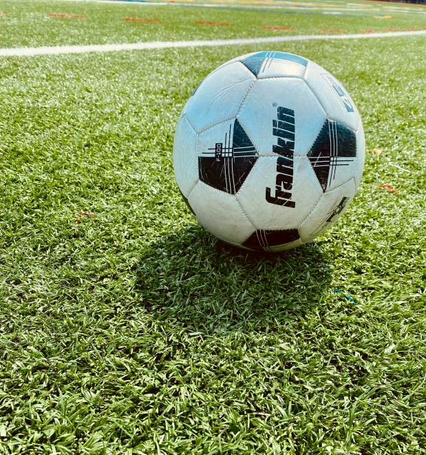 a soccer ball is shown in a field