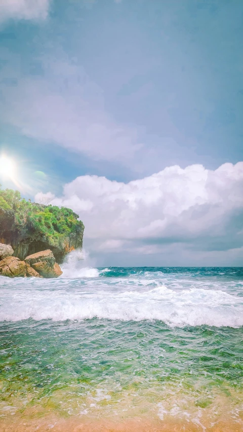 a rock sticking out of the ocean surrounded by the ocean