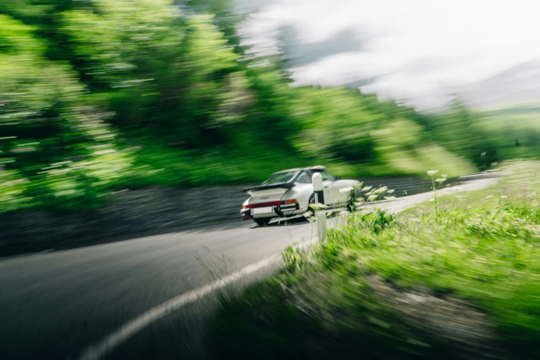 an image of car on road during daytime