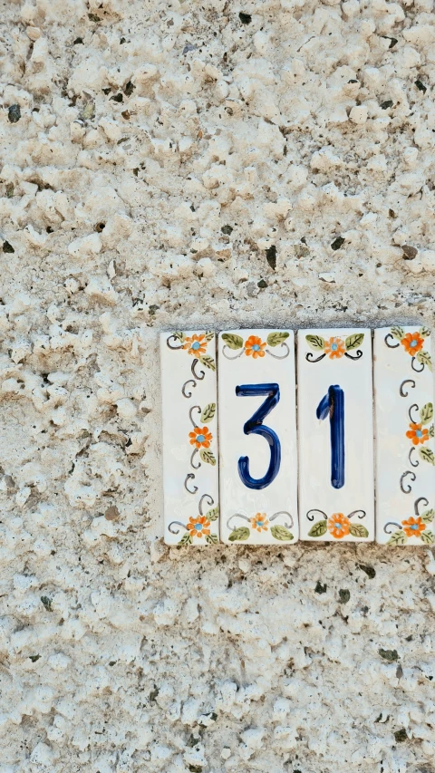 a tile number with the number 13 in the front