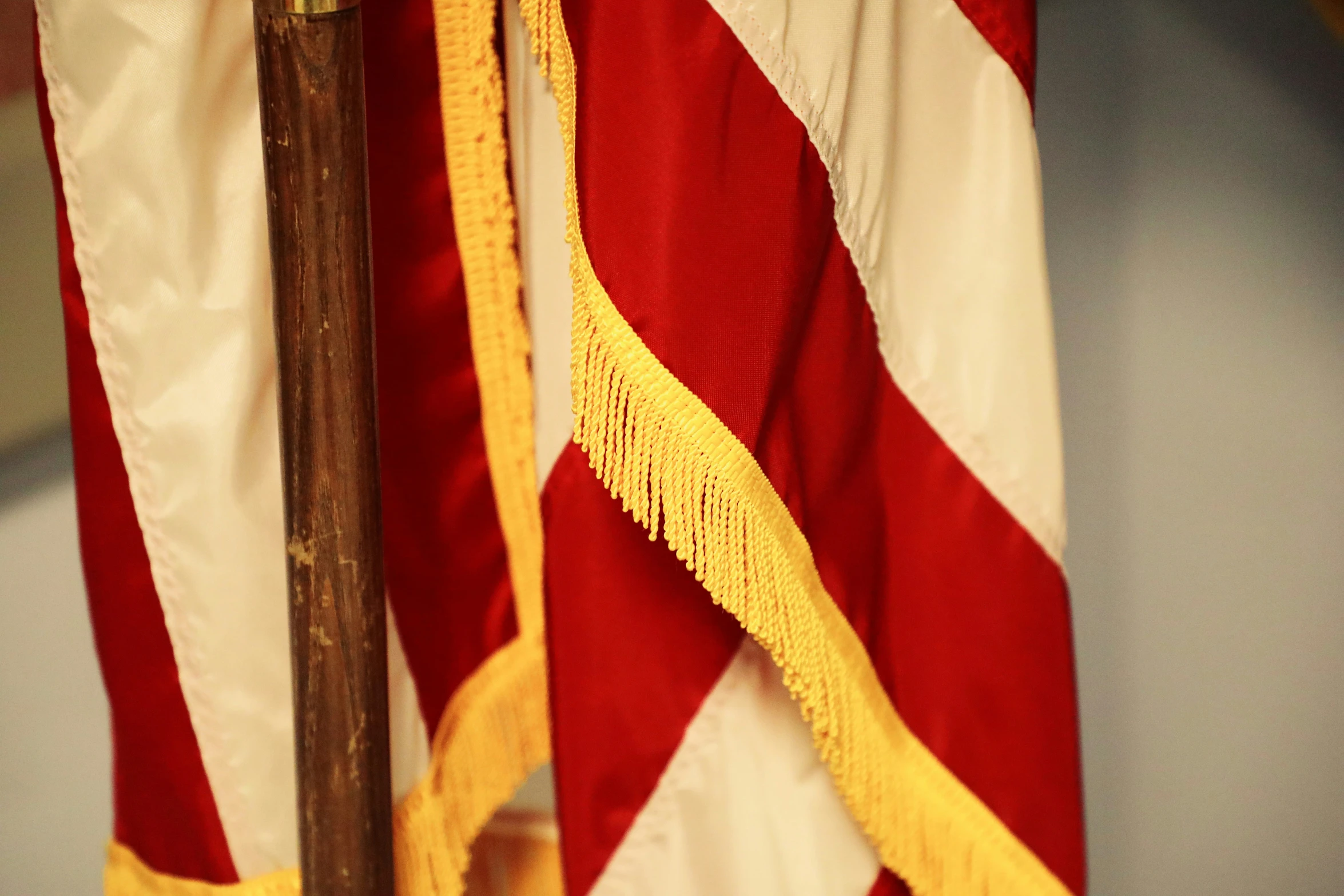 a big flag that is hanging up on a wall