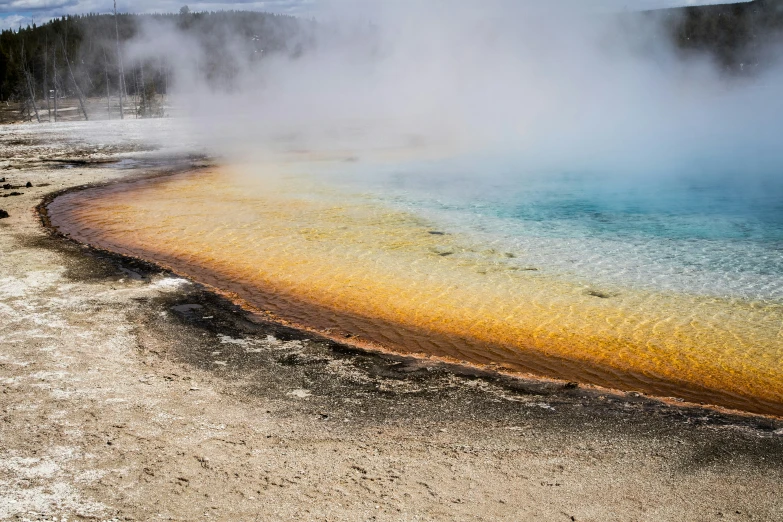 an image of a river with steam coming out of it