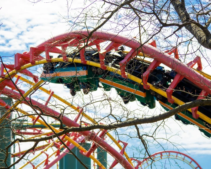 a person on a roller coaster during an amut park ride