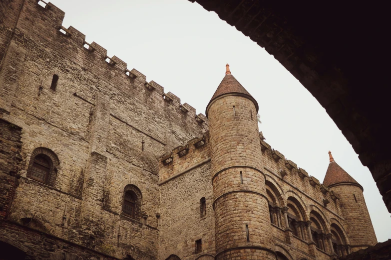 an old medieval castle has large turrets