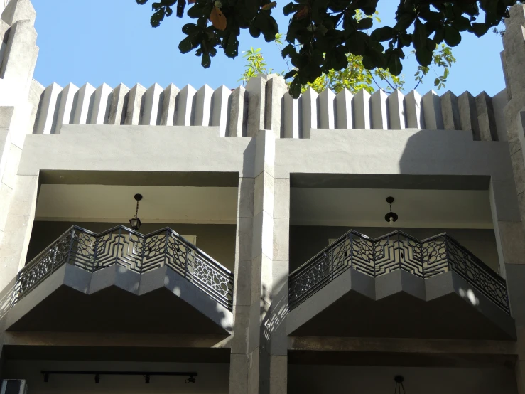 a very tall building with some ornate designs on it