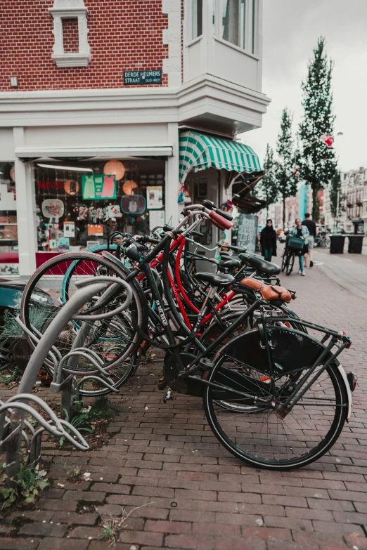 there are a bunch of bikes that are stacked on top of each other