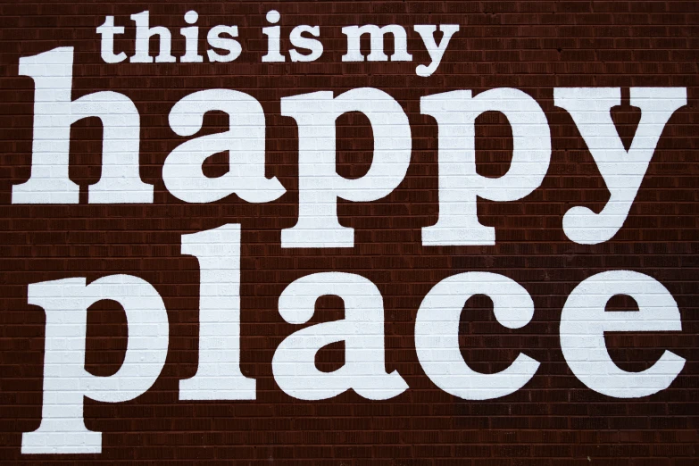 this is my happy place sign on the side of a building