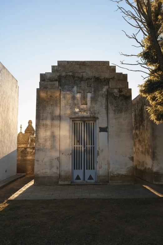 this small building is made of cement and stone