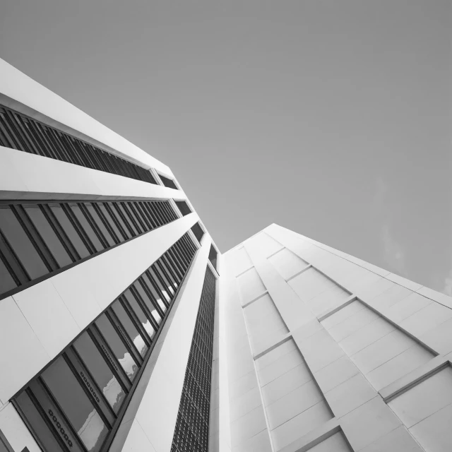 a large building is shown in black and white