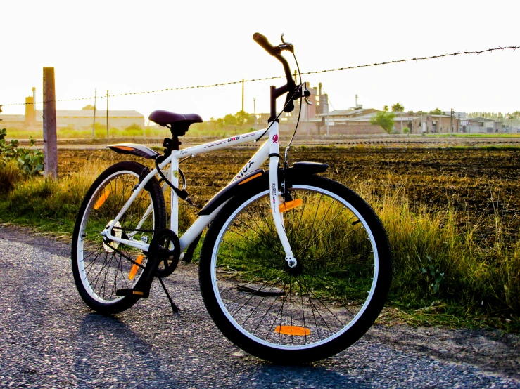 this is a bicycle parked on the side of the road