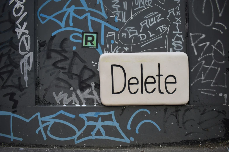 a sign on the door stating delete