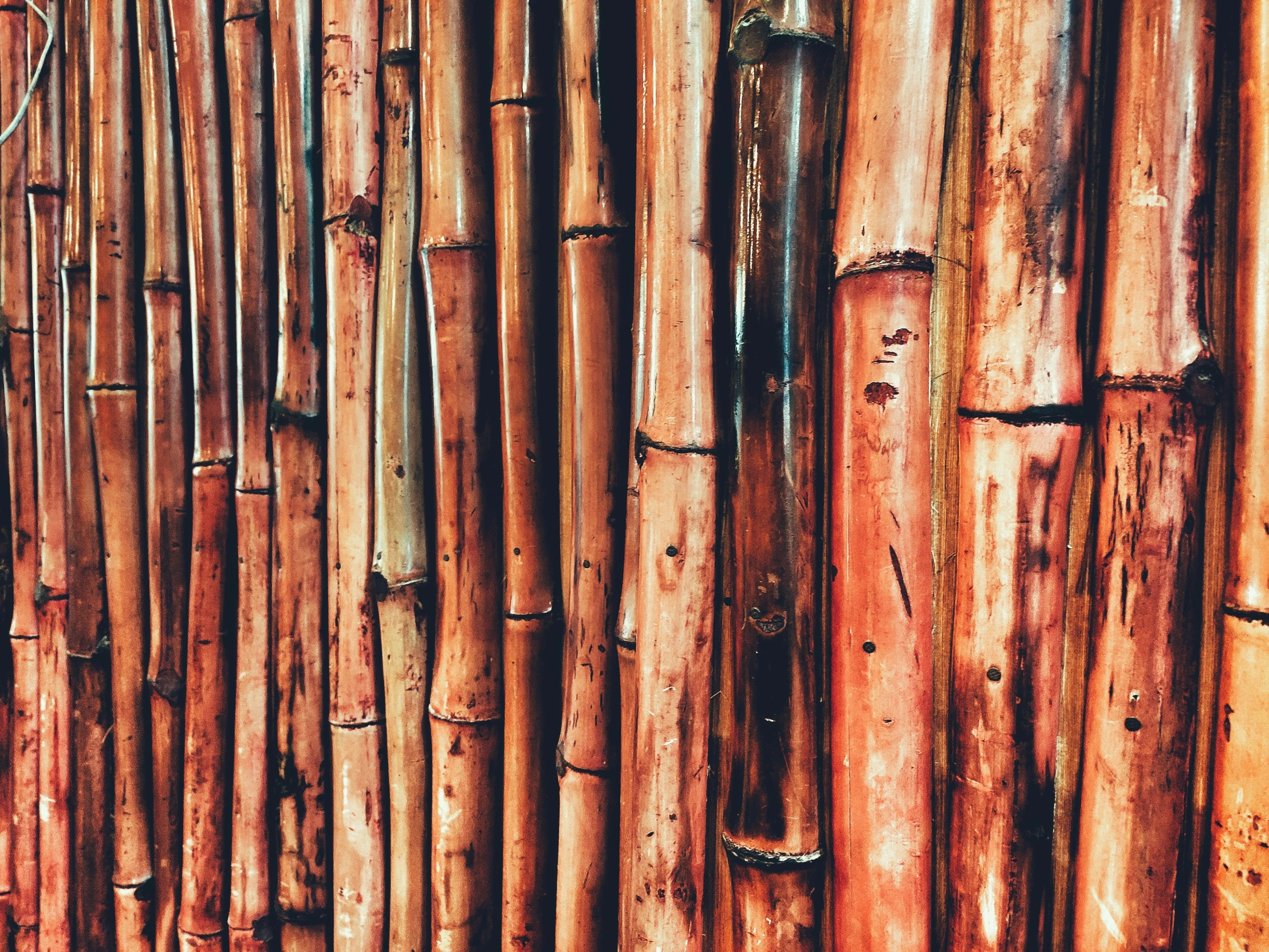 a background of many long brown wooden boards