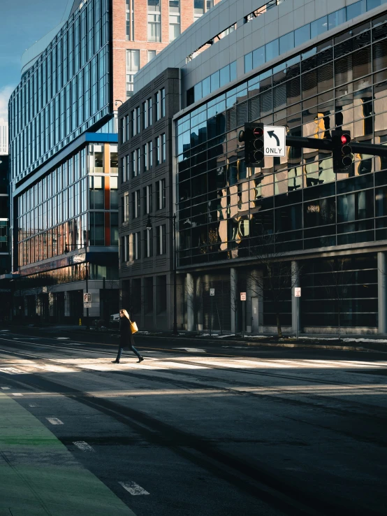 a man walking down the street in the daytime