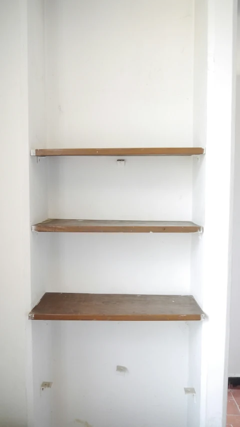 a group of shelves that are on one end