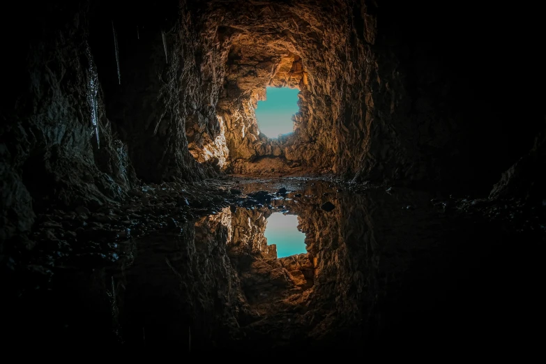 a large tunnel with water going into it