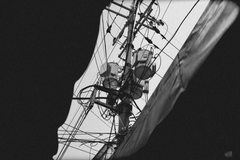 some kind of metal post attached to an electric pole