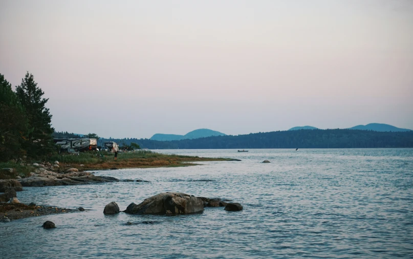 a body of water with some rocks in it