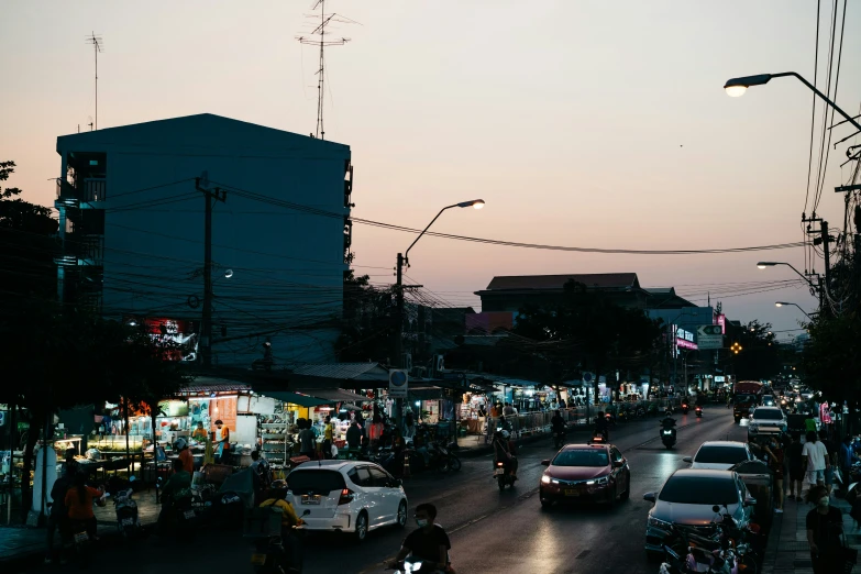 the city is busy at dusk with all its lights on