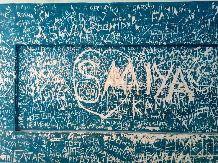 blue and white painting with the words'blam'written on it