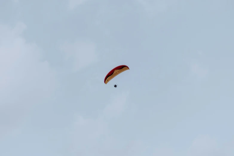 a parasail is seen in the air from underneath