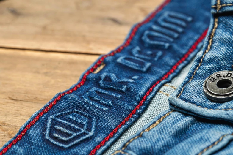 a close up s of a pair of jeans with ons in the back