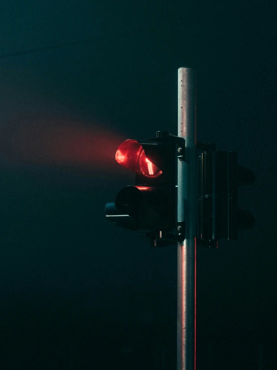 a traffic light lit up with red lighting