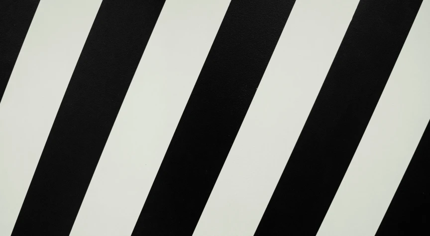 a close up image of a black and white striped surface