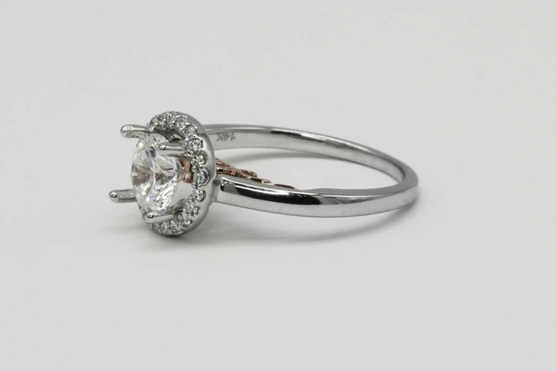 a fancy engagement ring setting is featured with the ring set