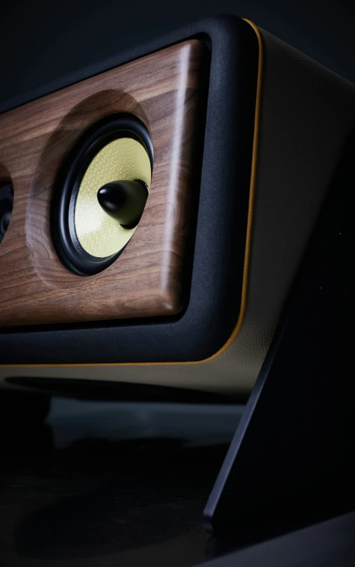 closeup of a speaker on a black surface