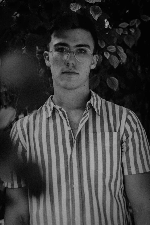 black and white pograph of a person in shirt