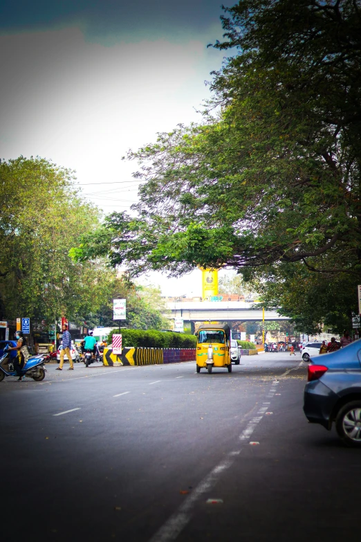 a group of cars and a bus on a road