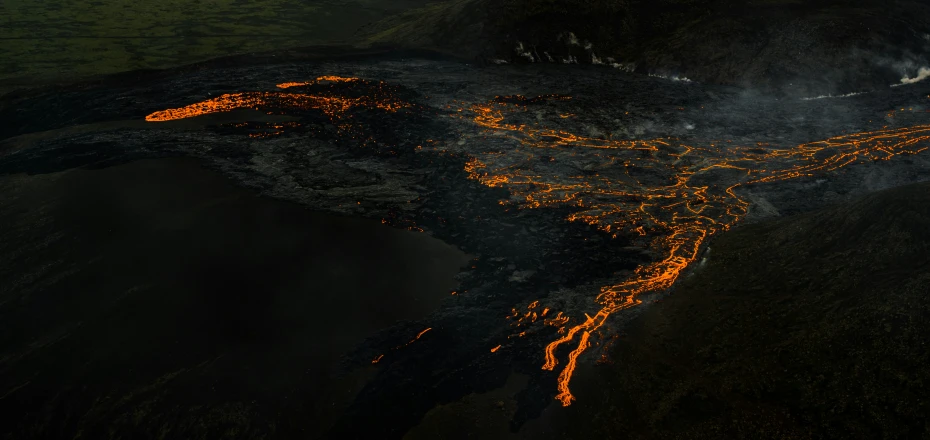 the night from space showing glowing orange lights